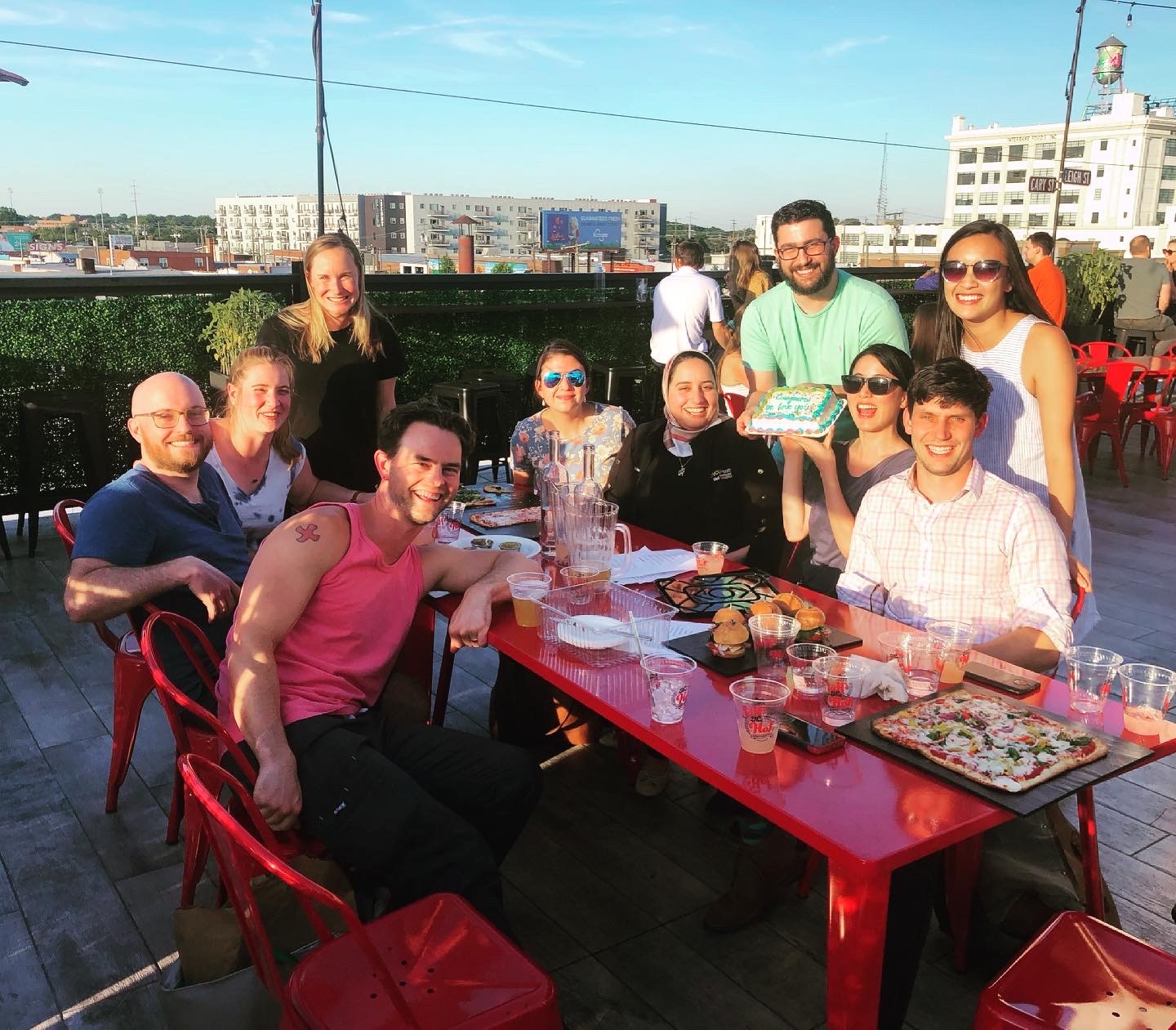 med-peds residents on a rooftop celebrating graduating class of 2021