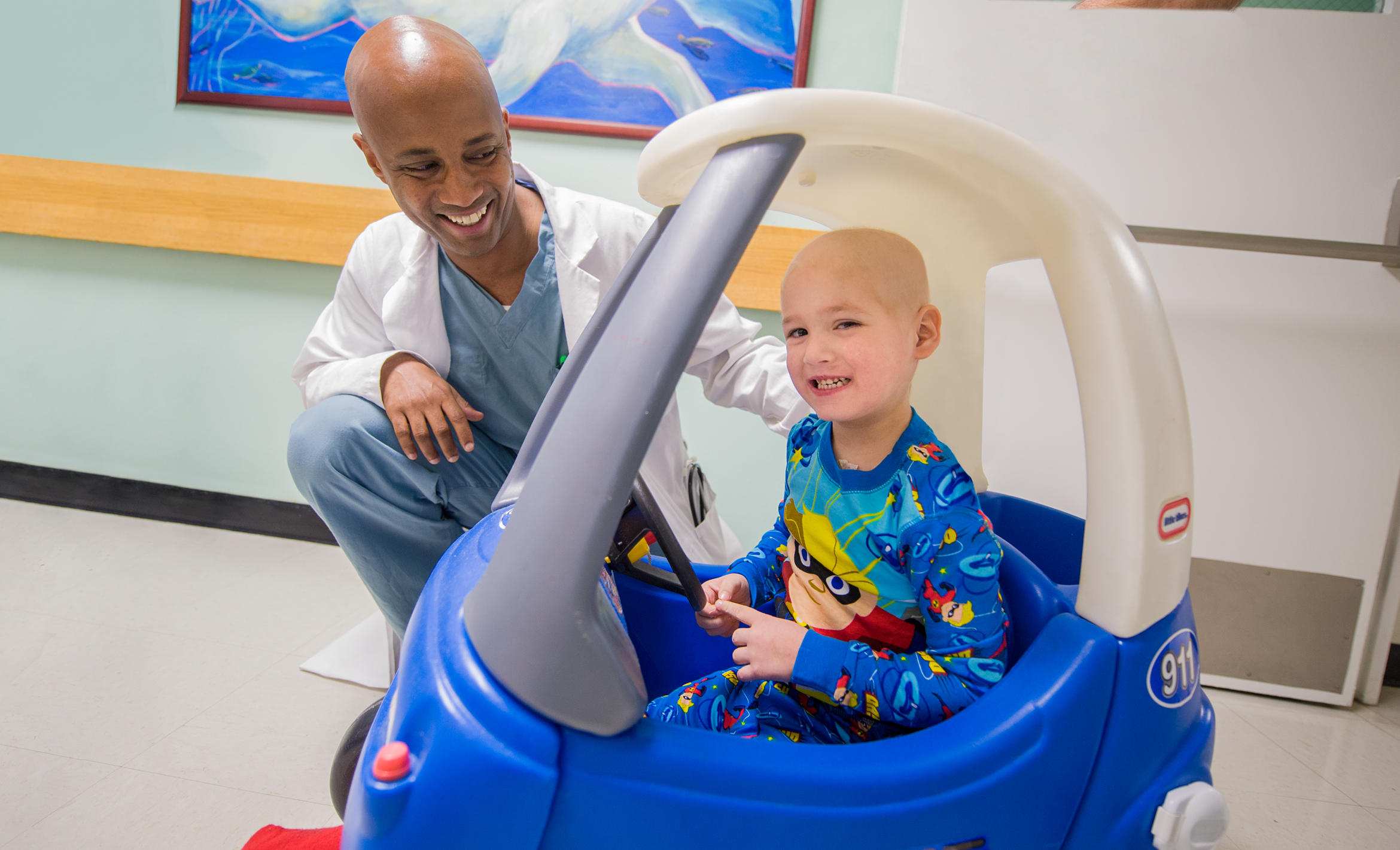 resident with child patient_ Charles E. Bagwell MD, Pediatric Surgery hospital shots