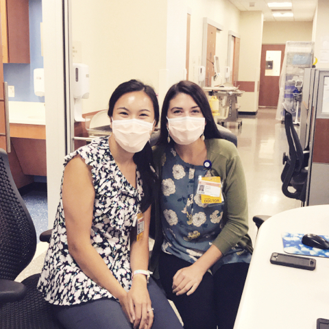 Drs. Ruggles and Zin pose together in Med-Peds continuity clinic